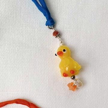 Pendentif Poussin en verre filé