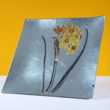 Daffodil table plate in decoupage under glass