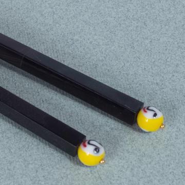Faces Chopsticks in rosewood, yellow [2]