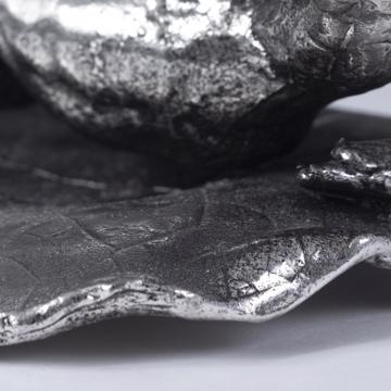 Silver plated bathers, silver, on her back [6]
