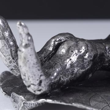 Silver plated bathers, silver, on her belly [6]