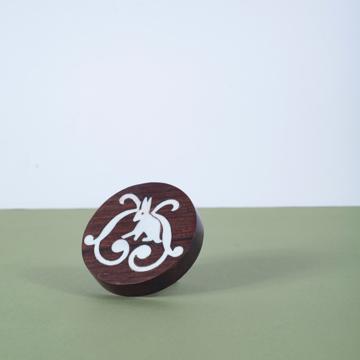 Rabbit door knob in wood and brass