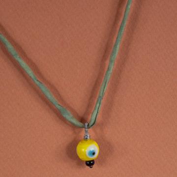 Breloque en Verre filé et tuquoise, jaune, oeil