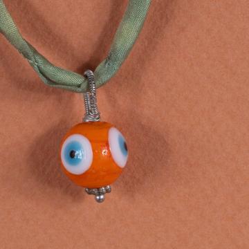 Charm in spun glass and turquoise, orange, eye [2]