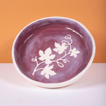 Wine dish in stamped earthenware