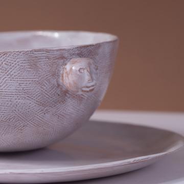 Face bowl in stamped earthenware