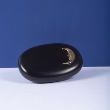 Ebony and gilt metal paperweight