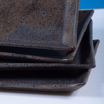 Black Gold tableware in stamped sandstone, bronze, 26 x 14 cm [2]