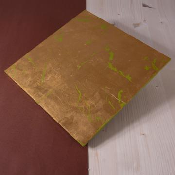 Gold leaf placemat in wood