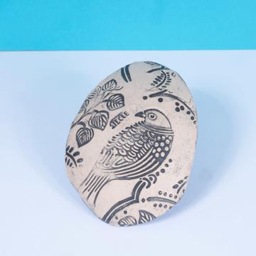 Bird bread dish in stamped sandstone