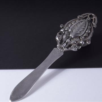 Stamped letter opener in silver plated