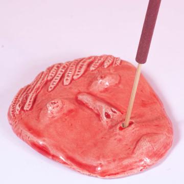 Face incense base in earthenware, red orange [2]